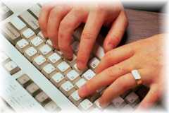 Bookkeeper's Hands on a Computer Keyboard